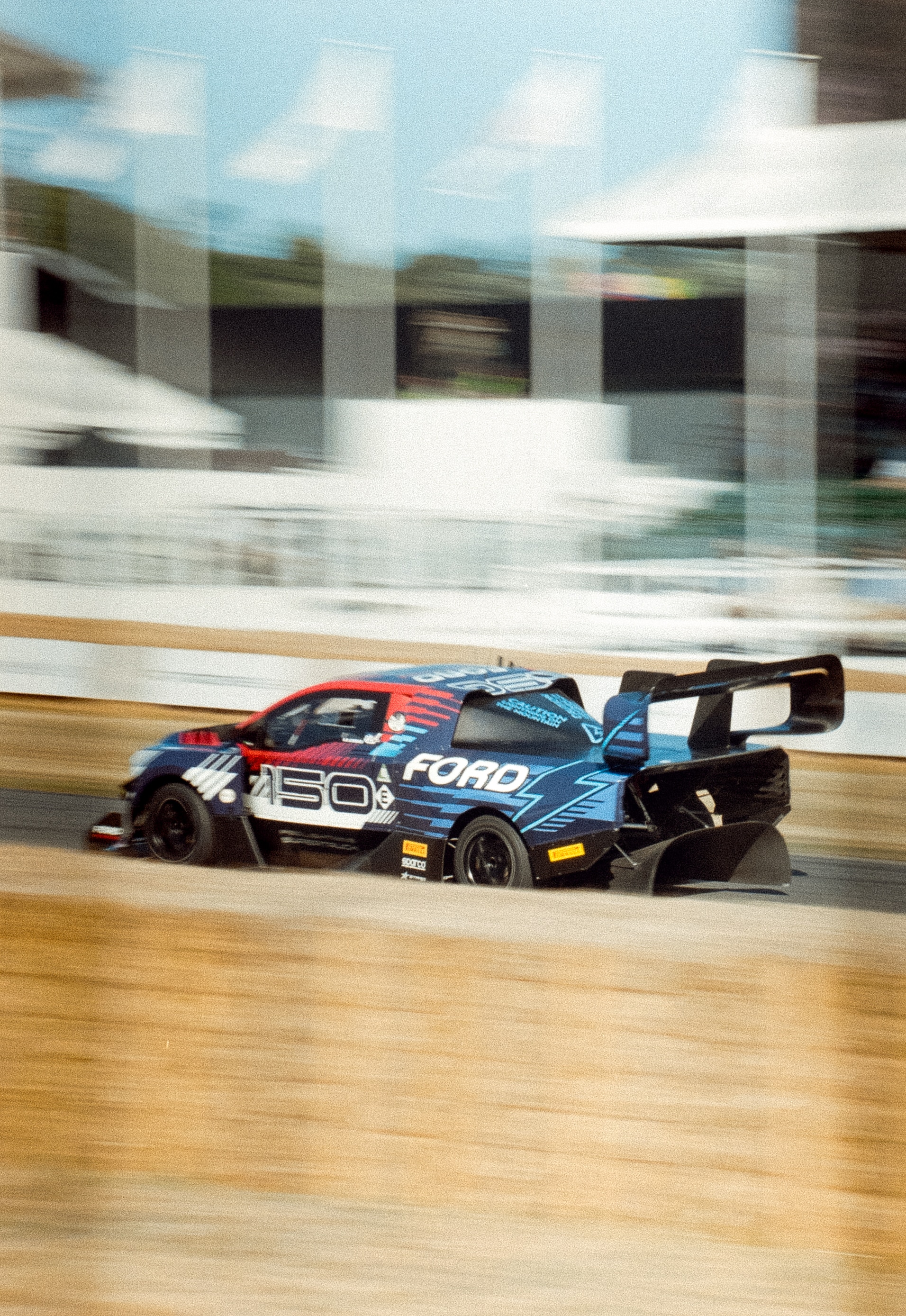 This was another panning shot. I really like how the flagpoles frame the SuperTruck giving it an almost three-dimensional effect. License valid for earned editorial, press releases, press kits. All non-broadcast digital and online media Region: Global. This content is solely for editorial use and for providing individual users with information. Any storage in databases, or any distribution to third parties within the scope of commercial use, or for commercial use is permitted with written consent from Ford in Europe GmbH only.